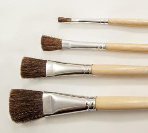 Camel hair paint brushes. Showing all 4 sizes lined up from thinest to thickest. beige brush handles.