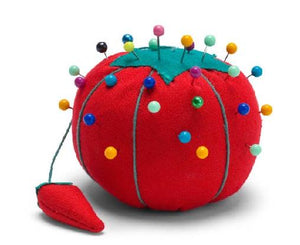 Small tomato shaped pin cushion with emery. Red with green detail. 