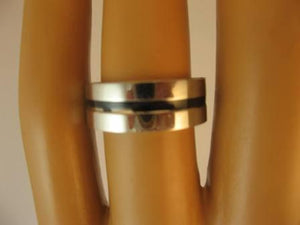 Silver Costume Ring w/black or blue inset bands.